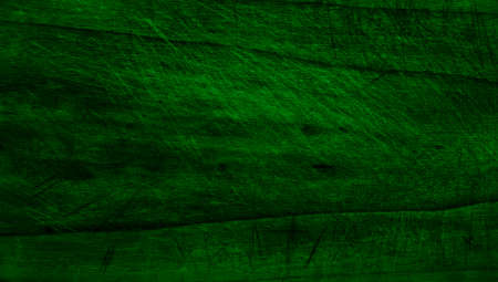 Old grunge green and black background texture, painted gradient black and green colors in sponged vintage designの写真素材