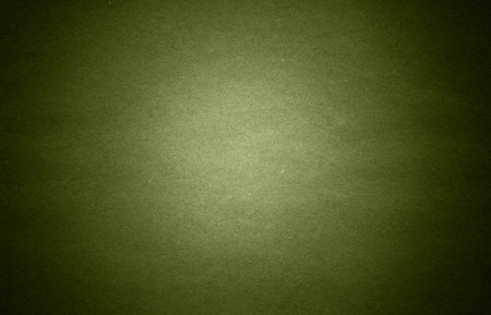 The texture of the dark olive velvet. The background of dark olive cloth. Luxury background of dark olive velvet. Military greenの写真素材