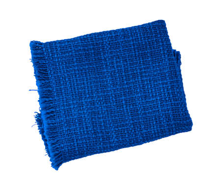 Blue cloth napkin isolated on white background. fiber towel or tablecloth. Cotton. Dishtowel. Kitchen. Serviette. Dishcloth. Textile.の写真素材