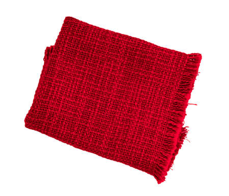 Red cloth napkin isolated on white background. fiber towel or tablecloth. Cotton. Dishtowel. Kitchen. Serviette. Dishcloth. Textile.の写真素材