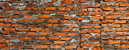 Wall, wallpaper made of dark brown brickの写真素材