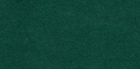 The texture of the dark green. The background of dark olive cloth. Luxury background of dark olive velvetの写真素材