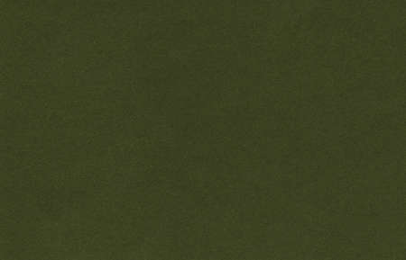 The texture of the dark olive velvet. The background of dark olive cloth. Luxury background of dark olive velvet. Military greenの写真素材