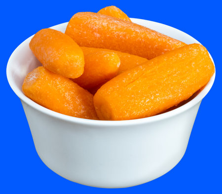 Small baby carrots in soup plates. Bowl with fresh carrots.の写真素材