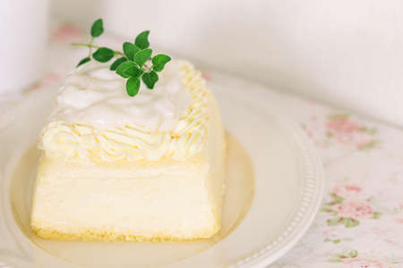 Fresh baked vanilla sponge cake frosting with dairy whipped cream topping with young coconut pudding...