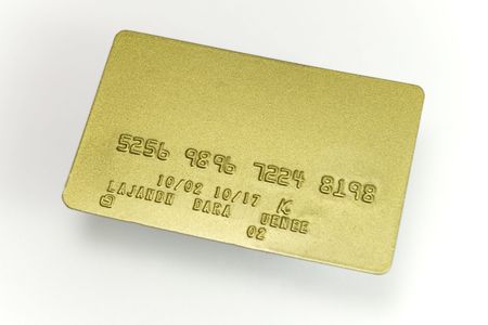 shine golden credit card on white backgroundの写真素材