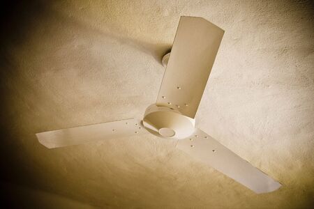 ceiling fan in hotel room in brown colorsの写真素材