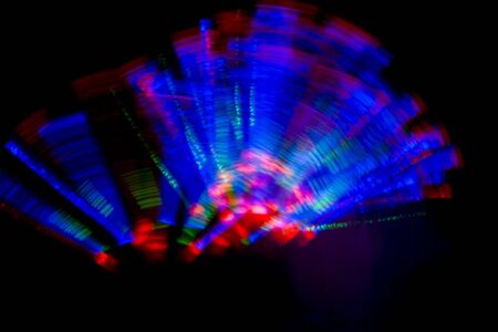 abstract color laser background in darknes backgroundの写真素材