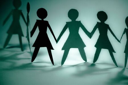 shadow figures of women group joinの写真素材