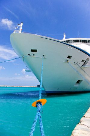 cruise ship anchored in a caribbean pier  の写真素材