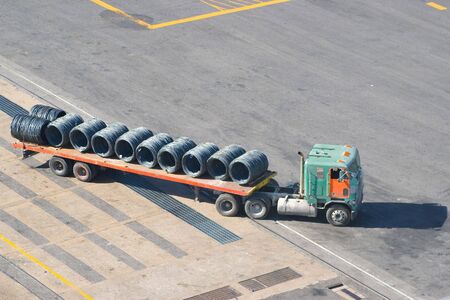 truck in pier with steel load