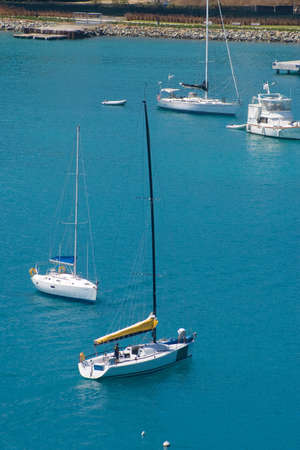 group of sailer boats in caribbean seaの写真素材