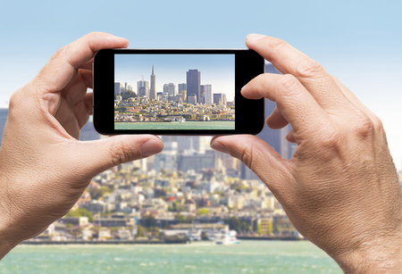 San Francisco bay taking picture smartphone, travel conceptの写真素材