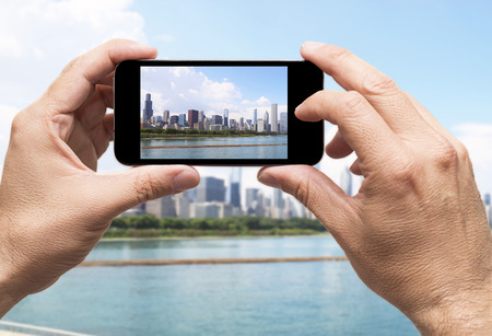 Chicago taking picture smartphone, travel conceptの写真素材