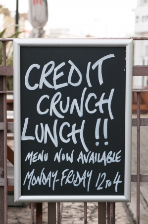 A bar sign in the UK offering a credit crunch lunchの写真素材