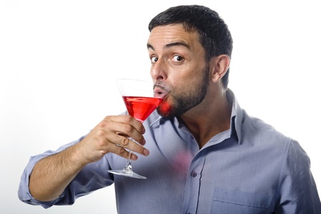 Young Man with Beard Drinking Cocktail  Isolated on White Backgroundの写真素材