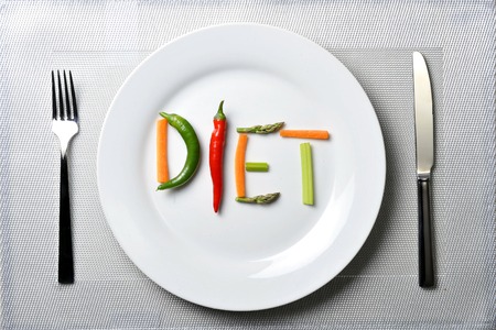 diet written with vegetables in healthy nutrition and dieting resolution conceptの写真素材