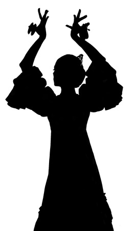 Silhouette of Spanish woman Flamenco dancer dancing Sevillanas in gypsy  dress の写真素材