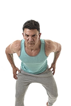 40s attractive hispanic sport man and bodybuilder in attitude corporate pose  with strong shoulders...