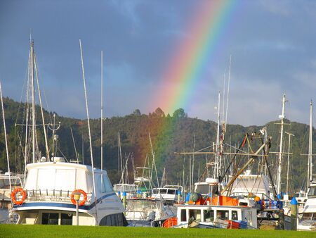 Rainbow And Harbor In New Zealandの写真素材