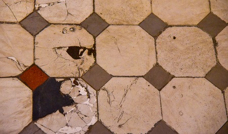 Old tiles on the floor with patterns old vintage sqwearの写真素材