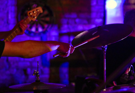 The neck of the guitar hand guitar player during the game , performer, jazz, bass, black, acoustic, handsの写真素材