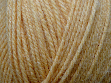 Wool skein of thread handcraft gray background texture fiber macroの写真素材