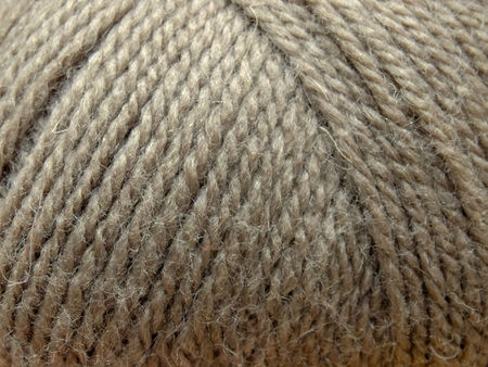 Wool skein of thread handcraft gray background texture fiber macroの写真素材
