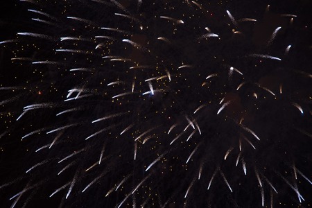 Fireworks against the dark sky. red blackの写真素材