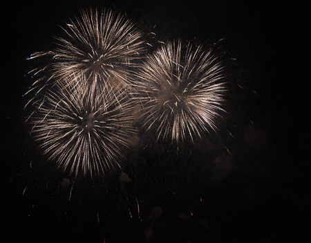 Fireworks against the dark sky. red blackの写真素材
