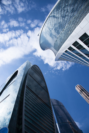 May 2019, Russia, Moscow.Bottom view of the business center Moscow city. Blue skyの写真素材