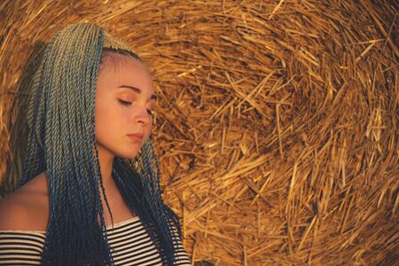 Portrait of a girl with Senegalese pigtailsの写真素材