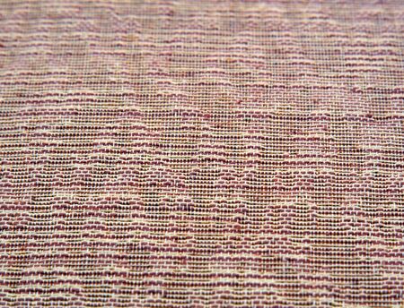 Full frame of a mottled Fabric sofa texture as backdrop. Horizontal classic mottled background...