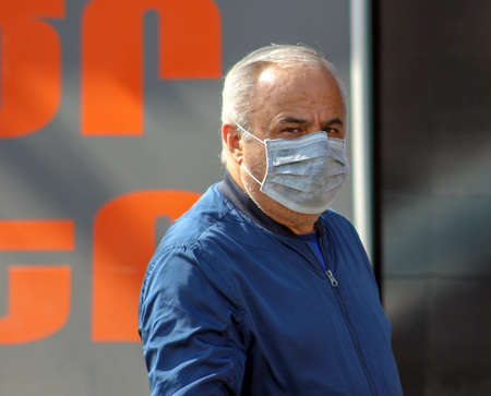Armenia, Yerevan, March 2020. People on the streets of Yerevan in masks and rubber gloves. Security...