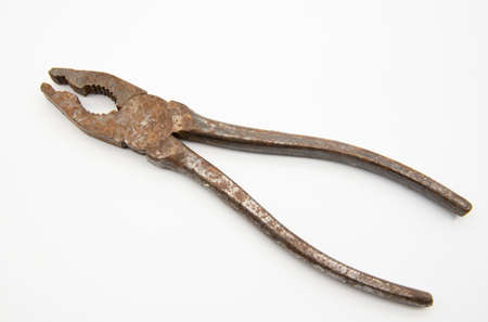 Old rusty pliers on a white background. Individual items for repair.の写真素材