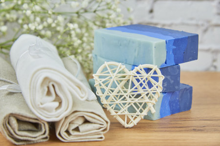 Organic handmade soap in blue tones decorated with dried flowers. Natural products, healthy lifestyle.の写真素材