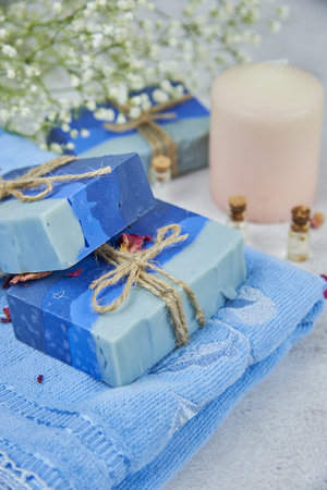 Bright organic aromatic handmade soap on a terry towel. Personal hygiene products, healthy lifestyle.の写真素材
