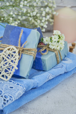 Bright organic aromatic handmade soap on a terry towel. Personal hygiene products, healthy lifestyle.の写真素材