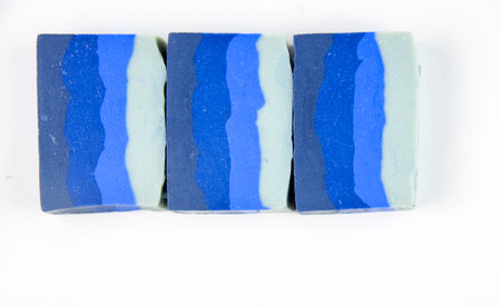 Fragrant organic multi-colored soap on a white background. Natural products, healthy lifestyle.の写真素材