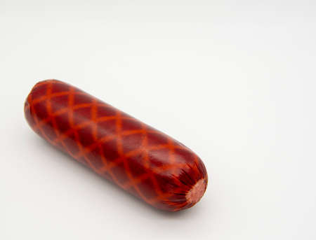 A sausage loaf in a natural shell on a white background.の写真素材