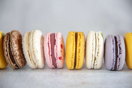 Typical and colorful french macaroons pastries. Food backgrounds, copy space for text.の写真素材