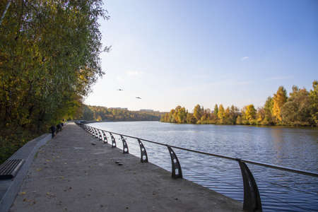 Embankment of the Moskva river on a sunny October day. A warm place for long walks and sports.の写真素材