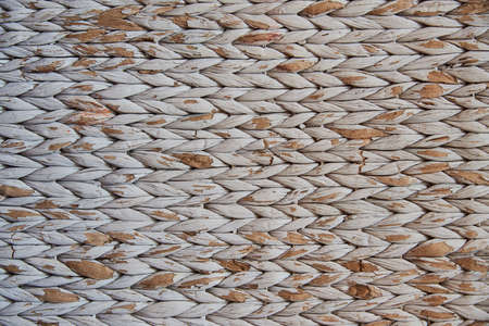 Abstract natural braided from vine, straw, cotton background. Full frame braided surface as a backdrop.の写真素材