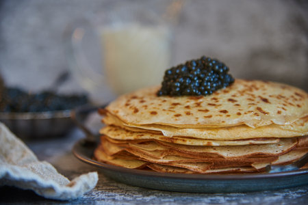 pancake week. Pancakes with black caviar. food background.の写真素材