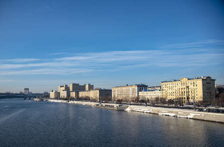 Russia, Moscow, February 2022. View of the Moskva River and Frunzenskaya Embankment from the Crimean Bridge on a sunny winter day.のeditorial素材