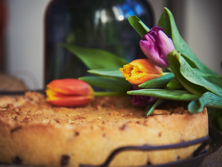 Delicate tulips on a handmade cake. Birthday gift, Food background.の写真素材