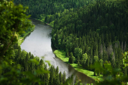 Bend of the mountain river in woodland in Siberiaの写真素材