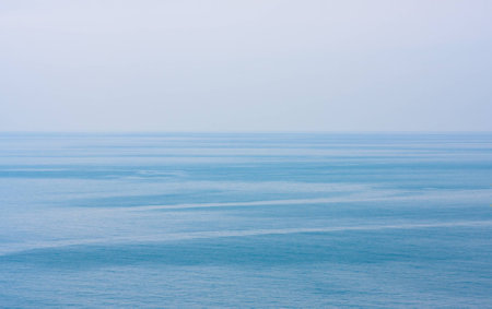 Blue clean sea or ocean and clear sky backgroundの写真素材