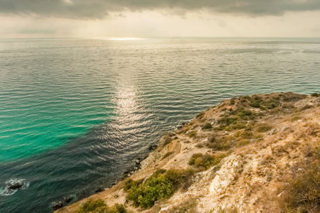 View of Black Sea from the cape Fiolent at sunset, near Sevastopol, Crimea peninsula. Picturesque sea landscape in HDRの写真素材