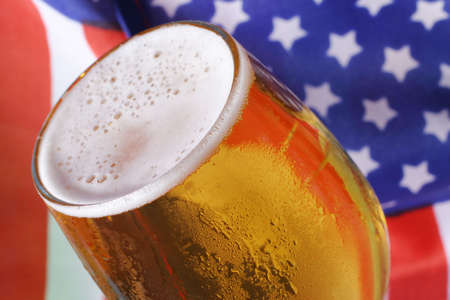 Cold beer macro and the American flag.の写真素材